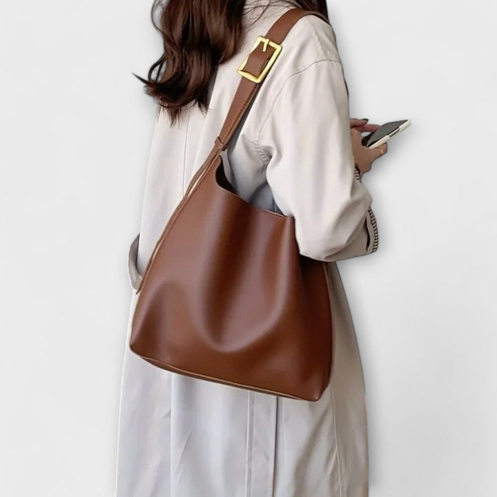 Olivia – Elegant Skinnaxelväska